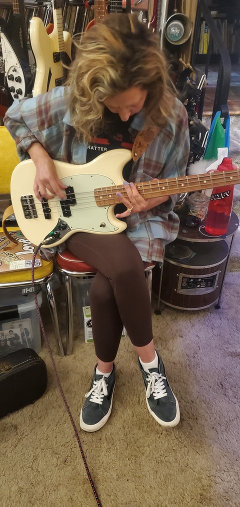 BnK Lisa laying down bass